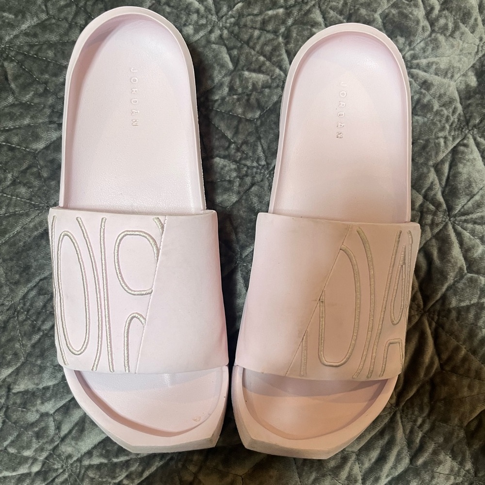 Like new Air Jordan ladies size 10 lavender pink slides